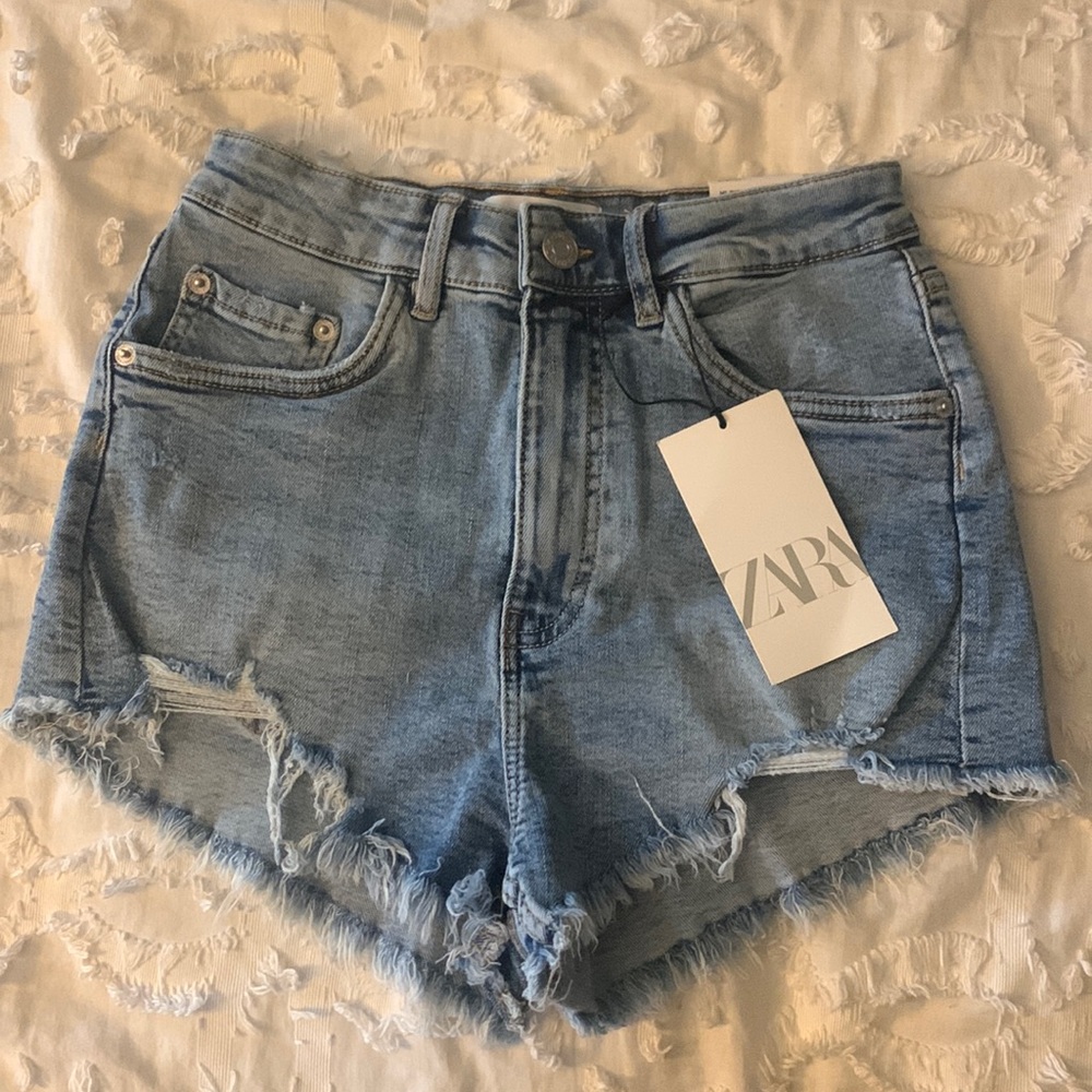 Size 2 brand new Zara jean shorts. Light blue and new with tags.